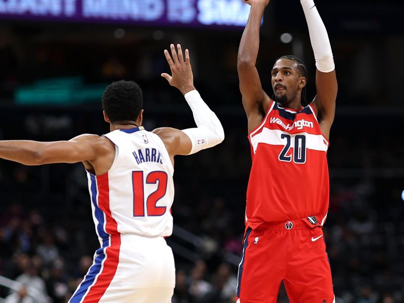 WASHINGTON, DC - NOVEMBER 17: Alexandre Sarr #20 of the Washington Wizards shoots in front of Tobias Harris #12 of the Detroit Pistons during the first half at Capital One Arena on November 17, 2024 in Washington, DC. NOTE TO USER: User expressly acknowledges and agrees that, by downloading and or using this photograph, User is consenting to the terms and conditions of the Getty Images License Agreement. (Photo by Patrick Smith/Getty Images)