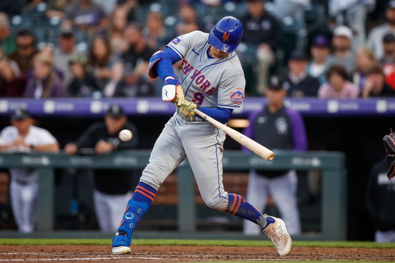 May 26, 2023; Denver, Colorado, USA; New York Mets center fielder Brandon Nimmo (9) hits a triple in the fifth inning against the Colorado Rockies at Coors Field. Mandatory Credit: Isaiah J. Downing-USA TODAY Sports