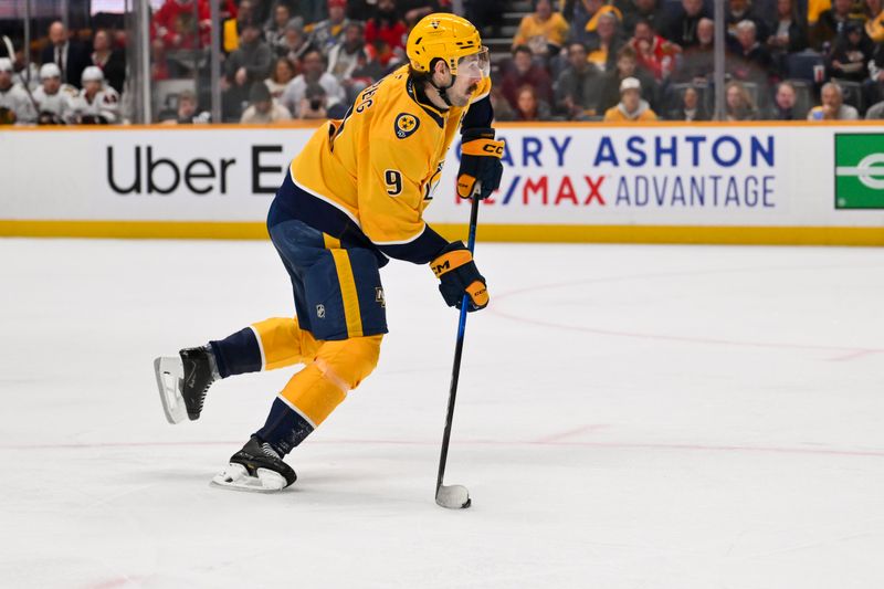 Feb 26, 2026; Nashville, Tennessee, USA;  Nashville Predators left wing Filip Forsberg (9) takes a shot on goal against the Chicago Blackhawks during the first period at Bridgestone Arena. Mandatory Credit: Steve Roberts-Imagn Images