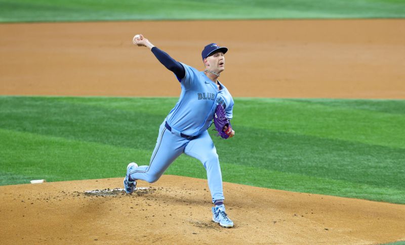 Sep 18, 2024; Arlington, Texas, USA;  Toronto Blue Jays starting pitcher Bowden Francis (44) throws during the first inning against the Texas Rangers at Globe Life Field. Mandatory Credit: Kevin Jairaj-Imagn Images