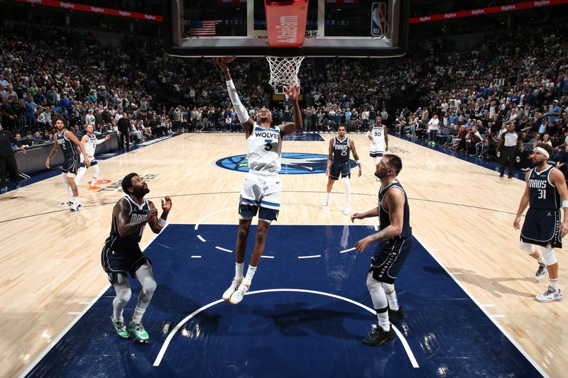 MINNEAPOLIS, MN -  OCTOBER 29: Jaden McDaniels #3 of the Minnesota Timberwolves drives to the basket during the game against the Dallas Mavericks on October 29, 2024 at Target Center in Minneapolis, Minnesota. NOTE TO USER: User expressly acknowledges and agrees that, by downloading and or using this Photograph, user is consenting to the terms and conditions of the Getty Images License Agreement. Mandatory Copyright Notice: Copyright 2024 NBAE (Photo by David Sherman/NBAE via Getty Images)