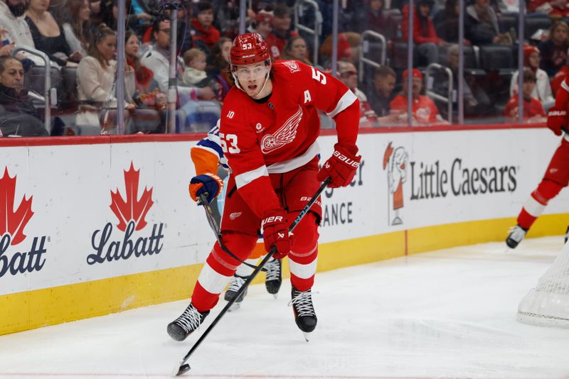 Dec 16, 2025; Detroit, Michigan, USA;  Detroit Red Wings defenseman Moritz Seider (53) skates with the puck in the first period against the New York Islanders at Little Caesars Arena. Mandatory Credit: Rick Osentoski-Imagn Images