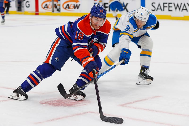 Jan 18, 2026; Edmonton, Alberta, CAN; Edmonton Oilers forward Zach Hyman (18) carries the puck around St. Louis Blues defensemen Phillip Broberg (6) during the first period at Rogers Place. Mandatory Credit: Perry Nelson-Imagn Images