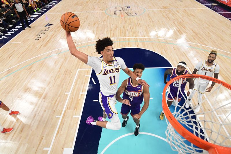 LOS ANGELES, CA - OCTOBER 6: Jaxson Hayes #11 of the Los Angeles Lakers drives to the basket during the game against the Phoenix Suns on October 6, 2024 at Acrisure Arena in Palm Springs, California. NOTE TO USER: User expressly acknowledges and agrees that, by downloading and/or using this Photograph, user is consenting to the terms and conditions of the Getty Images License Agreement. Mandatory Copyright Notice: Copyright 2024 NBAE (Photo by Adam Pantozzi/NBAE via Getty Images)