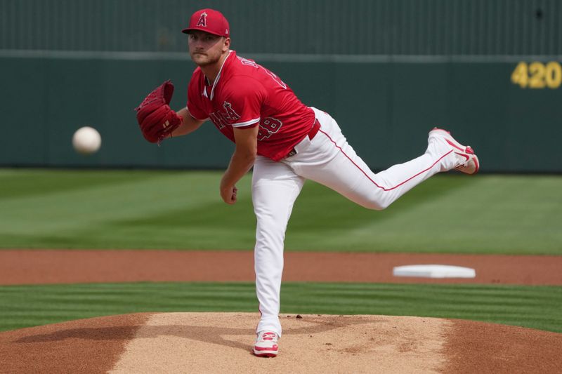 Mar 5, 2025; Tempe, Arizona, USA; Los Angeles Angels pitcher Reid Detmers (48) throws against the Los Angeles Dodgers in the first inning at Tempe Diablo Stadium. Mandatory Credit: Rick Scuteri-Imagn Images