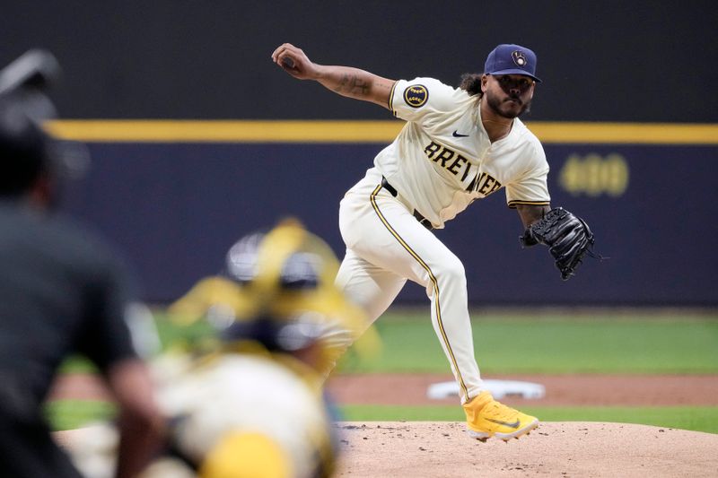 May 28, 2024; Milwaukee, Wisconsin, USA;  Milwaukee Brewers pitcher Freddy Peralta (51) throws a pitch during the first inning against the Chicago Cubs at American Family Field. Mandatory Credit: Jeff Hanisch-USA TODAY Sports