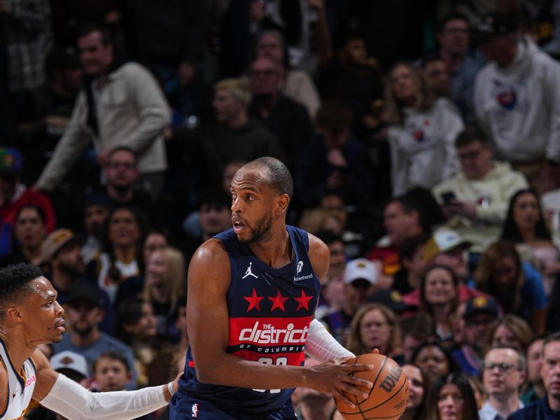 DENVER, CO - MARCH 15:  Khris Middleton #32 of the Washington Wizards handles the ball during the game against the Denver Nuggets on March 15, 2025 at Ball Arena in Denver, Colorado. NOTE TO USER: User expressly acknowledges and agrees that, by downloading and/or using this Photograph, user is consenting to the terms and conditions of the Getty Images License Agreement. Mandatory Copyright Notice: Copyright 2025 NBAE (Photo by Garrett Ellwood/NBAE via Getty Images)