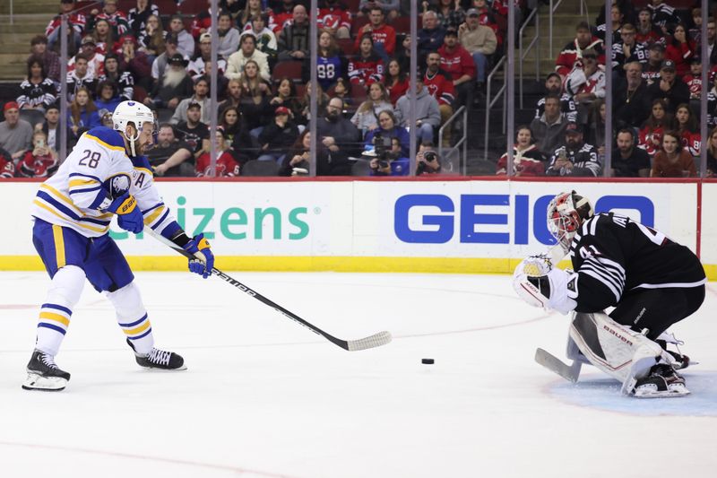 Oct 27, 2023; Newark, New Jersey, USA; New Jersey Devils goaltender Vitek Vanecek (41) makes a save against Buffalo Sabres left wing Zemgus Girgensons (28) during the second period at Prudential Center. Mandatory Credit: Vincent Carchietta-USA TODAY Sports