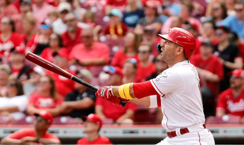 Sep 10, 2023; Cincinnati, Ohio, USA; Cincinnati Reds first baseman Joey Votto (19) hits a solo home run against the St. Louis Cardinals during the eighth inning at Great American Ball Park. Mandatory Credit: David Kohl-USA TODAY Sports