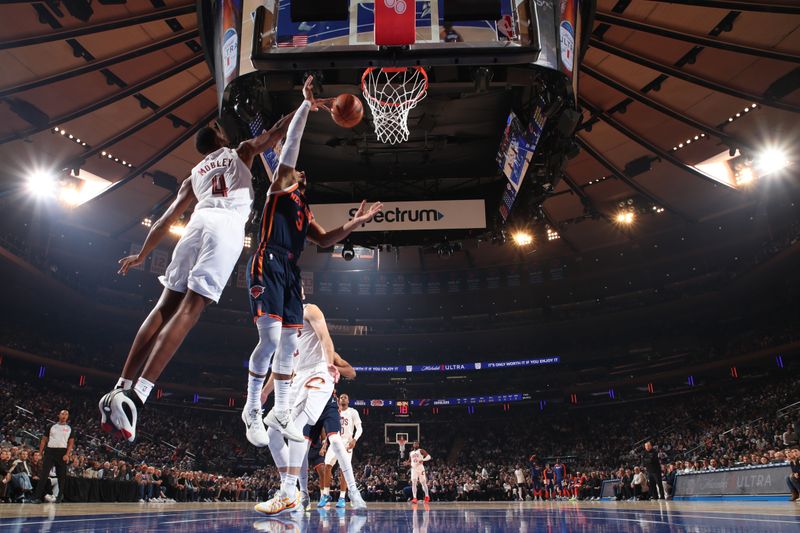 NEW YORK, NY - OCTOBER 28: Evan Mobley #4 of the Cleveland Cavaliers blocks a shot during the game against the New York Knicks on October 28, 2024 at Madison Square Garden in New York City, New York.  NOTE TO USER: User expressly acknowledges and agrees that, by downloading and or using this photograph, User is consenting to the terms and conditions of the Getty Images License Agreement. Mandatory Copyright Notice: Copyright 2024 NBAE  (Photo by Nathaniel S. Butler/NBAE via Getty Images)