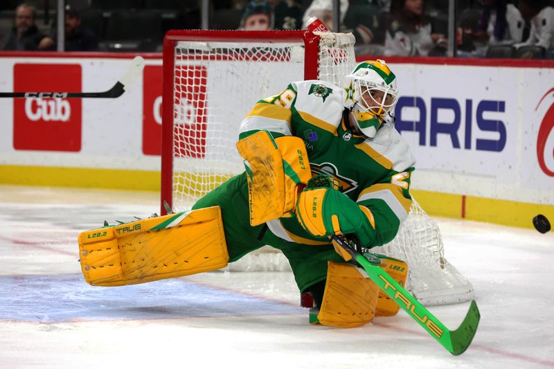 Apr 6, 2024; Saint Paul, Minnesota, USA; Minnesota Wild goaltender Marc-Andre Fleury (29) moves the puck against the Winnipeg Jets during the third period at Xcel Energy Center. Winnipeg won 4-2. Mandatory Credit: Bruce Fedyck-USA TODAY Sports