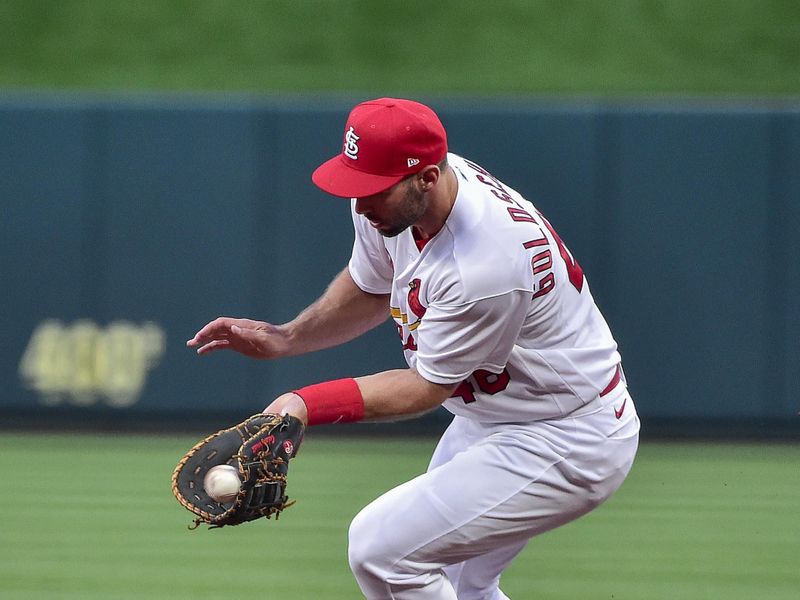 Apr 12, 2022; St. Louis, Missouri, USA;  St. Louis Cardinals first baseman Paul Goldschmidt (46) fields a ground ball against the Kansas City Royals during the second inning at Busch Stadium. Mandatory Credit: Jeff Curry-USA TODAY Sports