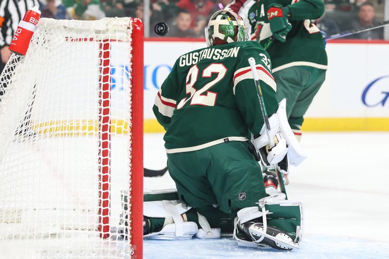 Oct 17, 2022; Saint Paul, Minnesota, USA; Colorado Avalanche forward Ben Meyers (59) scores a goal on Minnesota Wild goaltender Filip Gustavsson (32) during the first period at Xcel Energy Center. Mandatory Credit: Matt Krohn-USA TODAY Sports