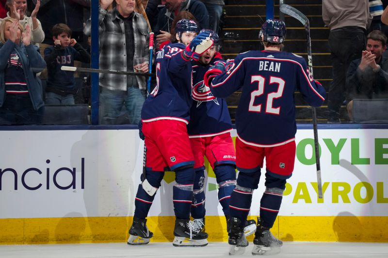 Jan 6, 2024; Columbus, Ohio, USA;  Columbus Blue Jackets center Cole Sillinger (4) celebrates after scoring a goal against the Minnesota Wild in the first period at Nationwide Arena. Mandatory Credit: Aaron Doster-USA TODAY Sports