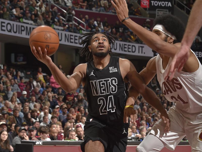 CLEVELAND, OH - NOVEMBER 9: Cam Thomas #24 of the Brooklyn Nets drives to the basket during the game against the Cleveland Cavaliers on November 9, 2024 at Rocket Mortgage FieldHouse in Cleveland, Ohio. NOTE TO USER: User expressly acknowledges and agrees that, by downloading and/or using this Photograph, user is consenting to the terms and conditions of the Getty Images License Agreement. Mandatory Copyright Notice: Copyright 2024 NBAE (Photo by David Liam Kyle/NBAE via Getty Images)