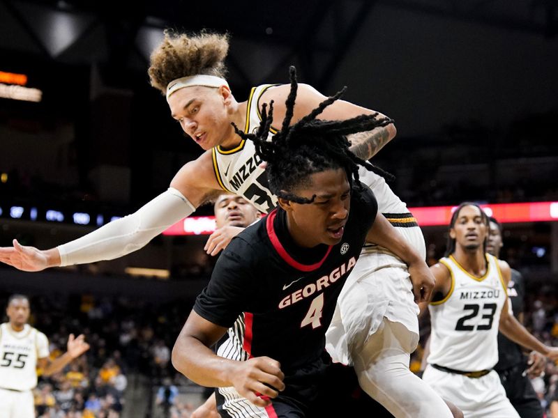 Jan 6, 2024; Columbia, Missouri, USA; Georgia Bulldogs guard Silas Demary Jr. (4) tries to shoot and is fouled by Missouri Tigers forward Noah Carter (35) during the first half at Mizzou Arena. Mandatory Credit: Denny Medley-USA TODAY Sports