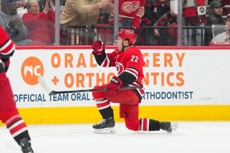 Jan 10, 2026; Raleigh, North Carolina, USA;  Carolina Hurricanes center Logan Stankoven (22) celebrates his goal against the Seattle Kraken during the first period at Lenovo Center. Mandatory Credit: James Guillory-Imagn Images