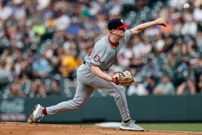 Jun 21, 2024; Denver, Colorado, USA; Washington Nationals starting pitcher DJ Herz (74) pitches in the first inning against the Colorado Rockies at Coors Field. Mandatory Credit: Isaiah J. Downing-USA TODAY Sports