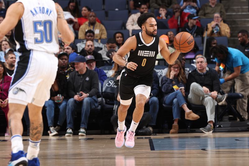 MEMPHIS, TN - JANUARY 26:  Vince Williams Jr. #5 of the Memphis Grizzlies handles the ball during the game against the Orlando Magic on January 26, 2024 at FedExForum in Memphis, Tennessee. NOTE TO USER: User expressly acknowledges and agrees that, by downloading and or using this photograph, User is consenting to the terms and conditions of the Getty Images License Agreement. Mandatory Copyright Notice: Copyright 2024 NBAE (Photo by Joe Murphy/NBAE via Getty Images)