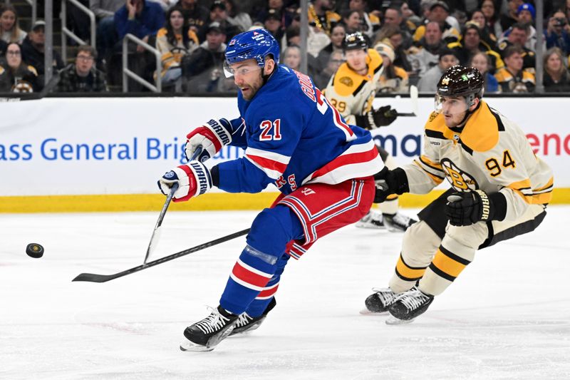 Mar 21, 2024; Boston, Massachusetts, USA; New York Rangers center Barclay Goodrow (21) takes a shot against the Boston Bruins during the second period at the TD Garden. Mandatory Credit: Brian Fluharty-USA TODAY Sports