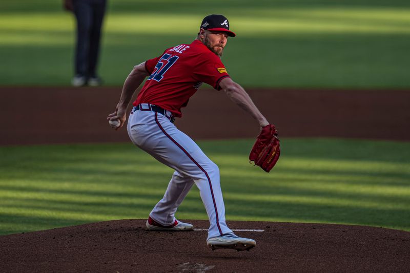 May 23, 2025; Cumberland, Georgia, USA; Atlanta Braves starting pitcher Chris Sale (51) pitches against the San Diego Padres during the first inning at Truist Park. Mandatory Credit: Dale Zanine-Imagn Images