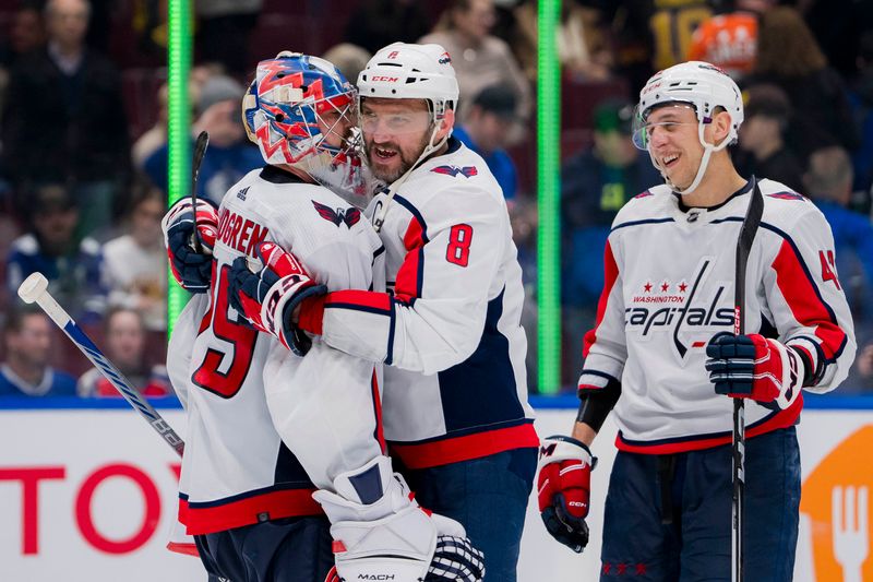 sMar 16, 2024; Vancouver, British Columbia, CAN; Washington Capitals defenseman Martin Fehervary (42) ans goalie Charlie Lindgren (79) and forward Alex Ovechkin (8) celebrate their victory against the Vancouver Canucks at Rogers Arena. Washington won 2 -1. Mandatory Credit: Bob Frid-USA TODAY Sports