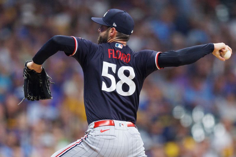 Aug 22, 2023; Milwaukee, Wisconsin, USA;  Minnesota Twins pitcher Dylan Floro (58) throws a pitch during the sixth inning against the Milwaukee Brewers at American Family Field. Mandatory Credit: Jeff Hanisch-USA TODAY Sports