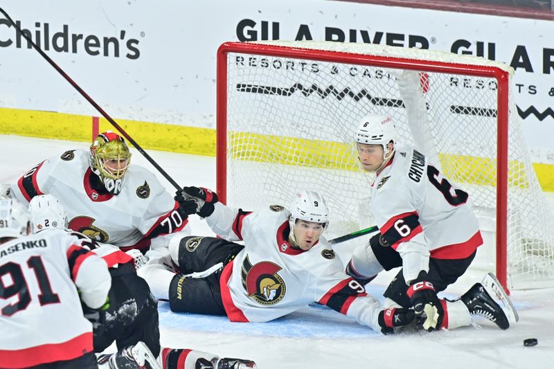 Dec 19, 2023; Tempe, Arizona, USA; Ottawa Senators goaltender Joonas Korpisalo (70),center Josh Norris (9) and defenseman Jakob Chychrun (6) defend the goal in the third period against the Arizona Coyotes at Mullett Arena. Mandatory Credit: Matt Kartozian-USA TODAY Sports