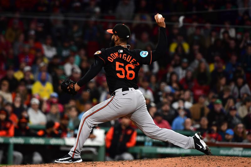 May 24, 2025; Boston, Massachusetts, USA; Baltimore Orioles relief pitcher Seranthony Dominguez (56) pitches during the ninth inning against the Boston Red Sox at Fenway Park. Mandatory Credit: Bob DeChiara-Imagn Images