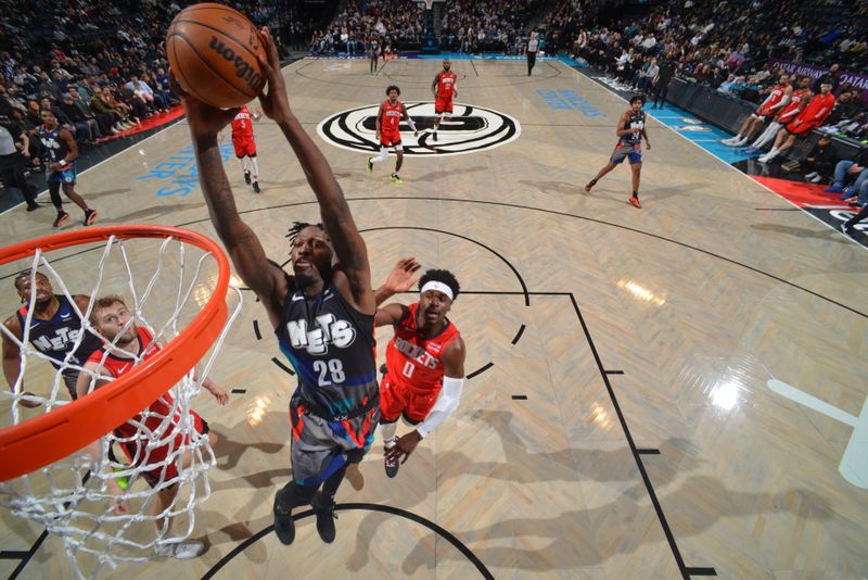 BROOKLYN, NY - JANUARY 27: Dorian Finney-Smith #28 of the Brooklyn Nets dunks the ball during the game against the Houston Rockets on January 27, 2024 at Barclays Center in Brooklyn, New York. NOTE TO USER: User expressly acknowledges and agrees that, by downloading and or using this Photograph, user is consenting to the terms and conditions of the Getty Images License Agreement. Mandatory Copyright Notice: Copyright 2024 NBAE (Photo by Jesse D. Garrabrant/NBAE via Getty Images)