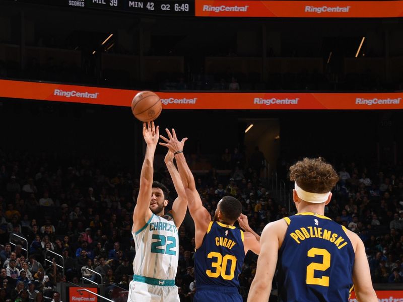 SAN FRANCISCO, CA - FEBRUARY 23: Vasilije Micic #22 of the Charlotte Hornets shoots a three point basket against the Golden State Warriors on February 23, 2024 at Chase Center in San Francisco, California. NOTE TO USER: User expressly acknowledges and agrees that, by downloading and or using this photograph, user is consenting to the terms and conditions of Getty Images License Agreement. Mandatory Copyright Notice: Copyright 2024 NBAE (Photo by Noah Graham/NBAE via Getty Images)