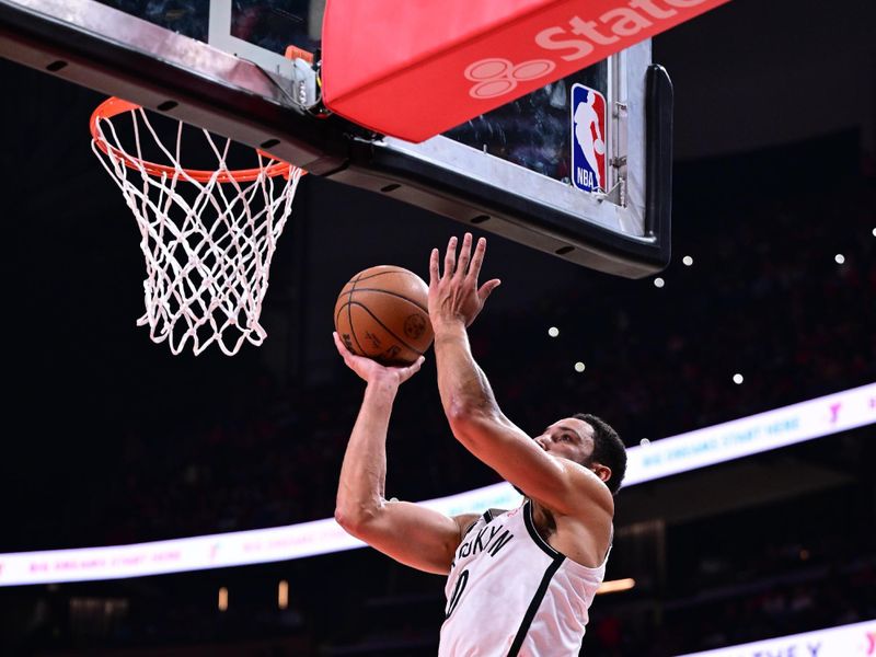 ATLANTA, GA - OCTOBER 23: Ben Simmons #10 of the Brooklyn Nets shoots the ball during the game against the Atlanta Hawks on October 23, 2024 at State Farm Arena in Atlanta, Georgia.  NOTE TO USER: User expressly acknowledges and agrees that, by downloading and/or using this Photograph, user is consenting to the terms and conditions of the Getty Images License Agreement. Mandatory Copyright Notice: Copyright 2024 NBAE (Photo by Adam Hagy/NBAE via Getty Images)