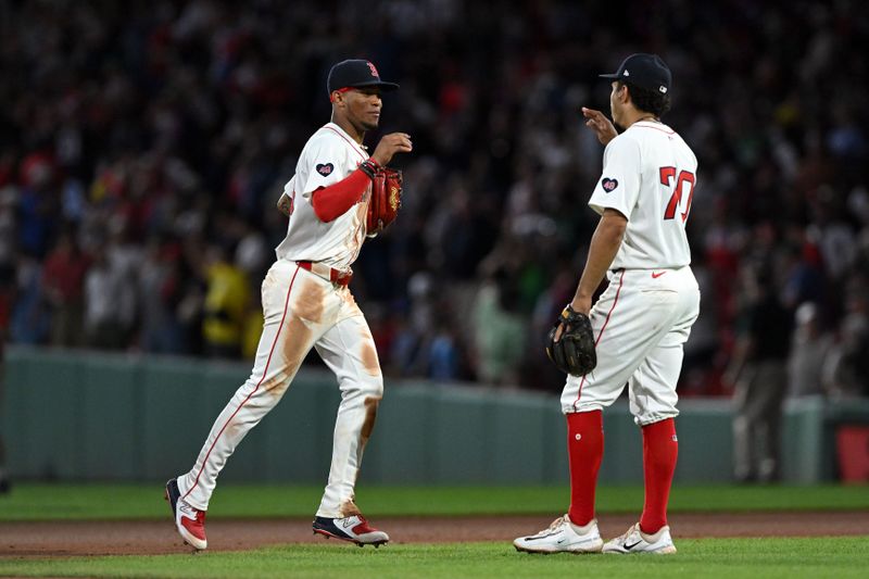 Jun 12, 2024; Boston, Massachusetts, USA; Boston Red Sox outfielder Ceddanne Rafaela (43) high-fives shortstop David Hamilton (70) after a game against the Philadelphia Phillies at Fenway Park. Mandatory Credit: Brian Fluharty-USA TODAY Sports