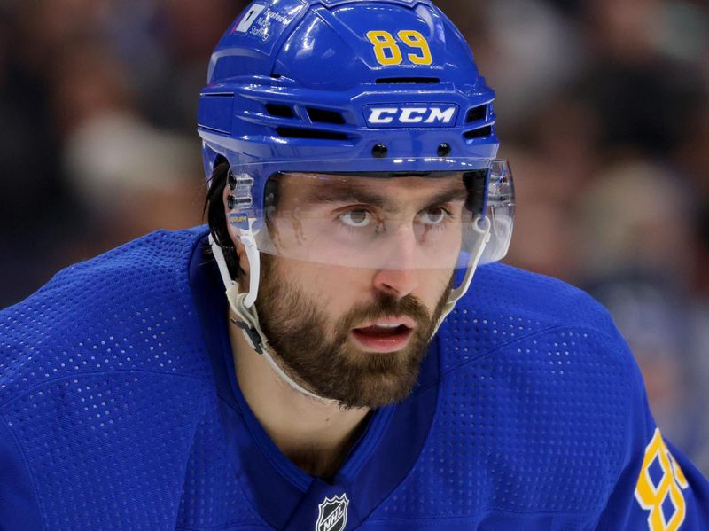 Dec 30, 2023; Buffalo, New York, USA;  Buffalo Sabres right wing Alex Tuch (89) during a stoppage in play against the Columbus Blue Jackets during the second period at KeyBank Center. Mandatory Credit: Timothy T. Ludwig-USA TODAY Sports