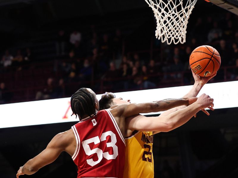 Jan 25, 2023; Minneapolis, Minnesota, USA; Minnesota Golden Gophers guard Will Ramberg (25) is fouled by Indiana Hoosiers guard Tamar Bates (53) during the first half at Williams Arena. Mandatory Credit: Matt Krohn-USA TODAY Sports