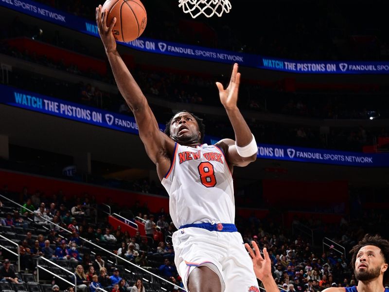 DETROIT, MI - NOVEMBER 1: OG Anunoby #8 of the New York Knicks drives to the basket during the game against the Detroit Pistons on November 1, 2024 at Little Caesars Arena in Detroit, Michigan. NOTE TO USER: User expressly acknowledges and agrees that, by downloading and/or using this photograph, User is consenting to the terms and conditions of the Getty Images License Agreement. Mandatory Copyright Notice: Copyright 2024 NBAE (Photo by Chris Schwegler/NBAE via Getty Images)