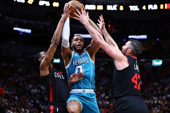 MIAMI, FLORIDA - DECEMBER 13: Miles Bridges #0 of the Charlotte Hornets drives to the basket during the third quarter of the game against the Miami Heat at Kaseya Center on December 13, 2023 in Miami, Florida. NOTE TO USER: User expressly acknowledges and agrees that, by downloading and or using this photograph, User is consenting to the terms and conditions of the Getty Images License Agreement. (Photo by Megan Briggs/Getty Images)