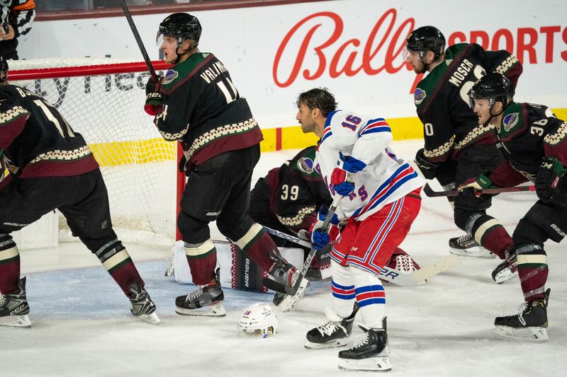 Oct 30, 2022; Tempe, Arizona, USA; New York Rangers forward Vincent Trocheck (16) looses his helmet while playing against the Arizona Coyotes during the third period at Mullett Arena. Mandatory Credit: Allan Henry-USA TODAY Sports