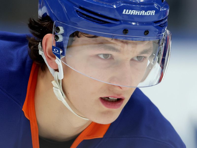 Oct 21, 2025; Elmont, New York, USA; New York Islanders defenseman Matthew Schaefer (48) sets for a face-off against the San Jose Sharks during the third period at UBS Arena. Mandatory Credit: Brad Penner-Imagn Images