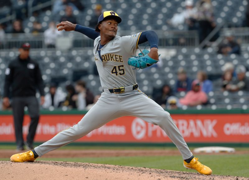 Apr 25, 2024; Pittsburgh, Pennsylvania, USA;  Milwaukee Brewers relief pitcher Abner Uribe (45) pitches against the Pittsburgh Pirates during the sixth inning at PNC Park. The Brewers won 7-5. Mandatory Credit: Charles LeClaire-USA TODAY Sports