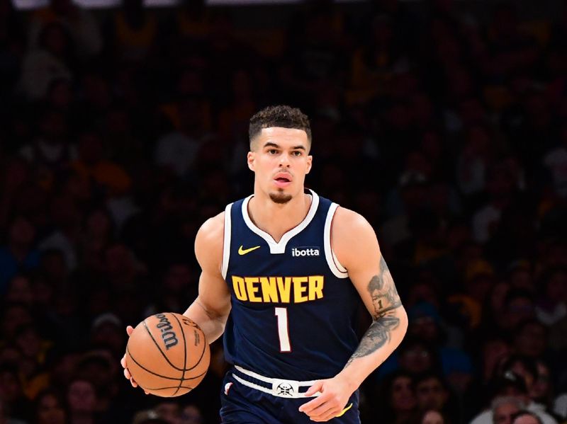 LOS ANGELES, CA - APRIL 27: Michael Porter Jr. #1 of the Denver Nuggets dribbles the ball during the game against the Los Angeles Lakers during Round 1 Game 4 of the 2024 NBA Playoffs on April 27, 2024 at Crypto.Com Arena in Los Angeles, California. NOTE TO USER: User expressly acknowledges and agrees that, by downloading and/or using this Photograph, user is consenting to the terms and conditions of the Getty Images License Agreement. Mandatory Copyright Notice: Copyright 2024 NBAE (Photo by Adam Pantozzi/NBAE via Getty Images)