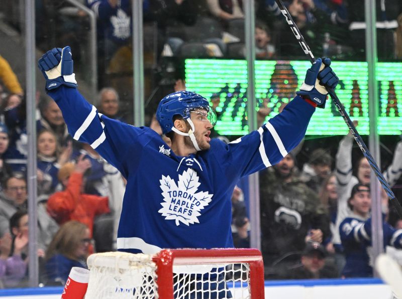 Jan 3, 2023; Toronto, Ontario, CAN; Toronto Maple Leafs forward Pierre Engvall (47) celebrates after scoring against the St. Louis Blues in the second period at Scotiabank Arena. Mandatory Credit: Dan Hamilton-USA TODAY Sports