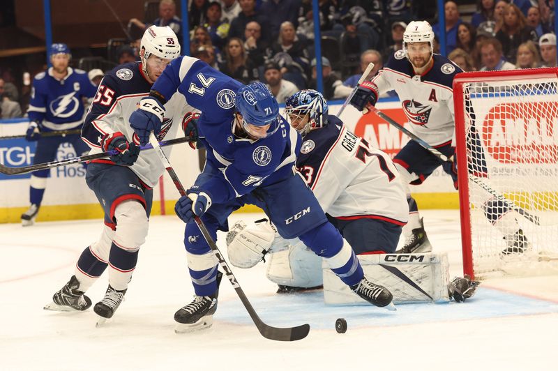 Apr 9, 2024; Tampa, Florida, USA; Tampa Bay Lightning center Anthony Cirelli (71) shoots and scores a goal on Columbus Blue Jackets goaltender Jet Greaves (73) during the third period at Amalie Arena. Mandatory Credit: Kim Klement Neitzel-USA TODAY Sports