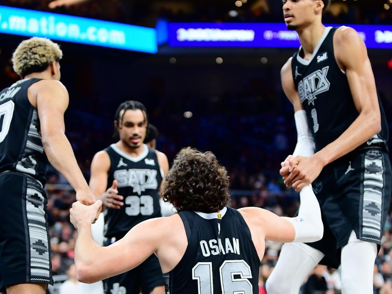 AUSTIN, TX - MARCH 17: Cedi Osman #16 of the San Antonio Spurs is helped up by Jeremy Sochan #10 and Victor Wembanyama #1 during the game against the Brooklyn Nets on March 17, 2024 at the Moody Center in Austin, Texas. NOTE TO USER: User expressly acknowledges and agrees that, by downloading and or using this photograph, user is consenting to the terms and conditions of the Getty Images License Agreement. Mandatory Copyright Notice: Copyright 2024 NBAE (Photos by Michael Gonzales/NBAE via Getty Images)