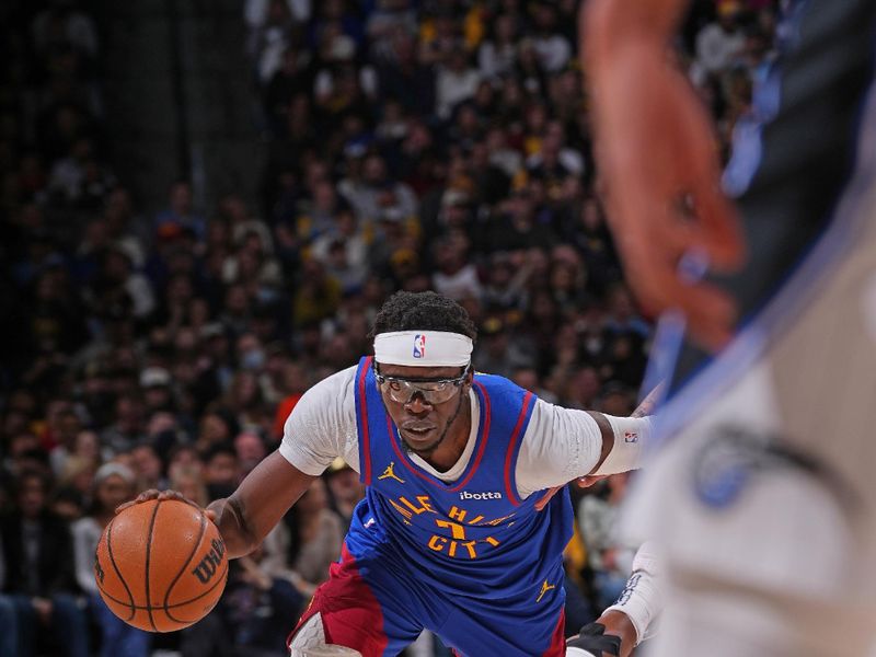 DENVER, CO - JANUARY 5: Reggie Jackson #7 of the Denver Nuggets drives to the basket during the game against the Orlando Magic on January 5, 2024 at the Ball Arena in Denver, Colorado. NOTE TO USER: User expressly acknowledges and agrees that, by downloading and/or using this Photograph, user is consenting to the terms and conditions of the Getty Images License Agreement. Mandatory Copyright Notice: Copyright 2024 NBAE (Photo by Bart Young/NBAE via Getty Images)