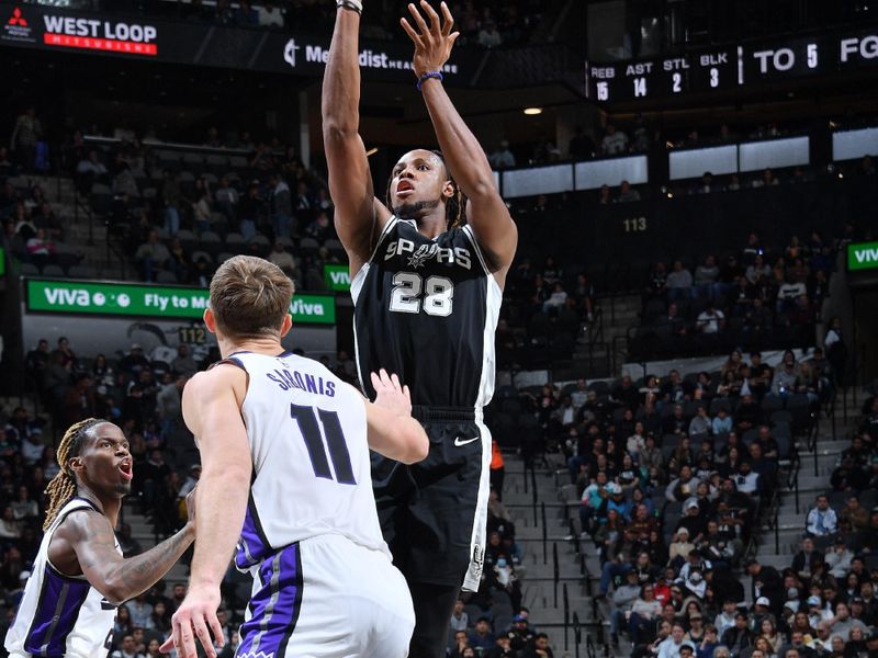 SAN ANTONIO, TX - DECEMBER 6:  Charles Bassey #28 of the San Antonio Spurs shoots the ball during the game against the Sacramento Kings on December 6, 2024 at the Frost Bank Center in San Antonio, Texas. NOTE TO USER: User expressly acknowledges and agrees that, by downloading and or using this photograph, user is consenting to the terms and conditions of the Getty Images License Agreement. Mandatory Copyright Notice: Copyright 2024 NBAE (Photos by Michael Gonzales/NBAE via Getty Images)