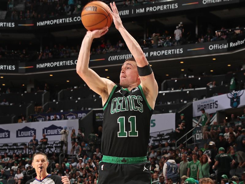 CHARLOTTE, NC - APRIL 1: Payton Pritchard #11 of the Boston Celtics three point basket during the game against the Charlotte Hornets on April 1, 2024 at Spectrum Center in Charlotte, North Carolina. NOTE TO USER: User expressly acknowledges and agrees that, by downloading and or using this photograph, User is consenting to the terms and conditions of the Getty Images License Agreement. Mandatory Copyright Notice: Copyright 2024 NBAE (Photo by Kent Smith/NBAE via Getty Images)