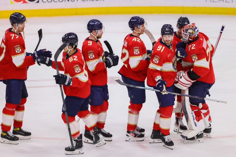 Apr 11, 2024; Sunrise, Florida, USA; Florida Panthers goaltender Sergei Bobrovsky (72) celebrates with teammates after the game against the Columbus Blue Jackets at Amerant Bank Arena. Mandatory Credit: Sam Navarro-USA TODAY Sports