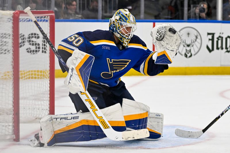 Dec 14, 2023; St. Louis, Missouri, USA;  St. Louis Blues goaltender Jordan Binnington (50) makes a save against the Ottawa Senators during the third period at Enterprise Center. Mandatory Credit: Jeff Curry-USA TODAY Sports