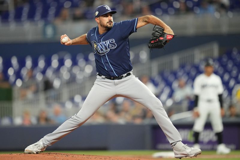 Aug 30, 2023; Miami, Florida, USA; Tampa Bay Rays starting pitcher Zach Eflin (24) pitches against the Miami Marlins in the first inning at loanDepot Park. Mandatory Credit: Jim Rassol-USA TODAY Sports